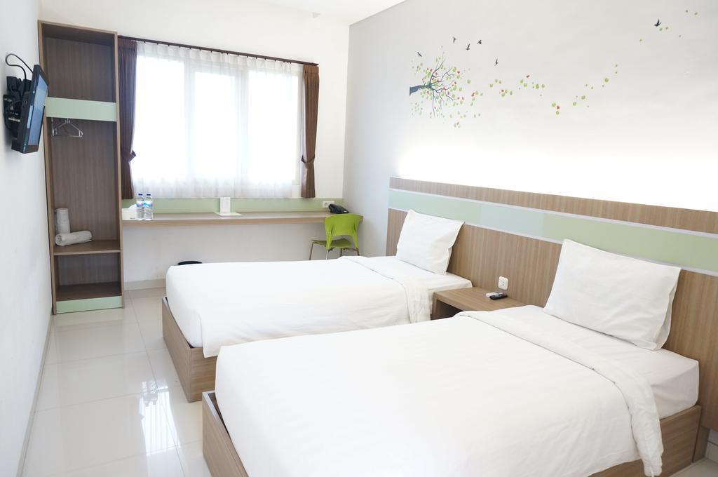 Rumah Cassa Guest House Surabaya Rom bilde